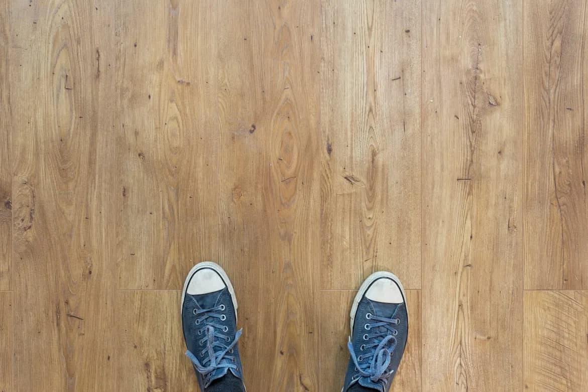 Contractor installing hardwood flooring