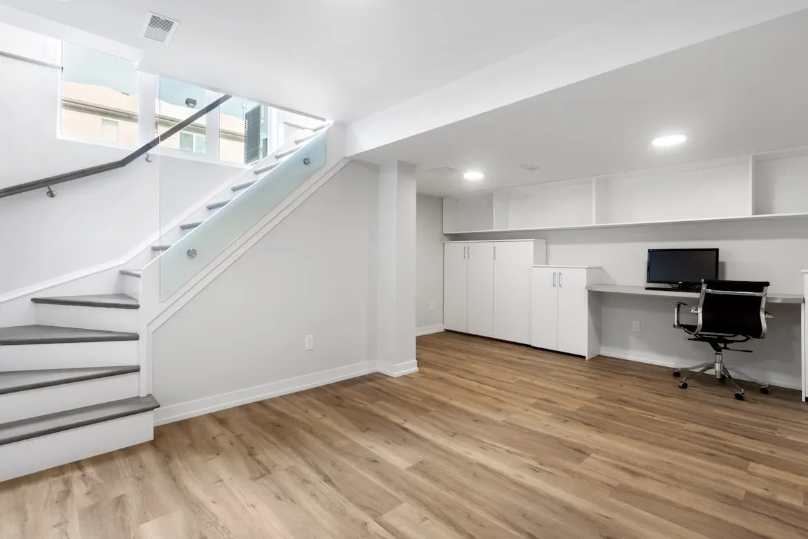Finished modern basement with bar and seating