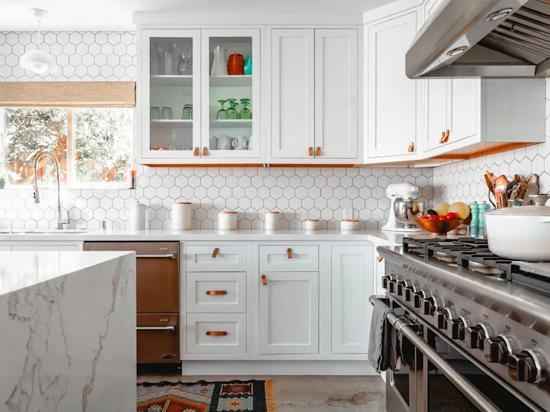 Cream modern kitchen with large window