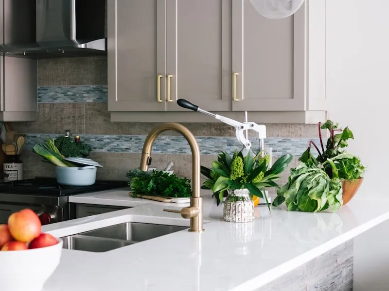 Elegant green kitchen with island